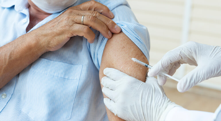 injection therapy on woman's arm